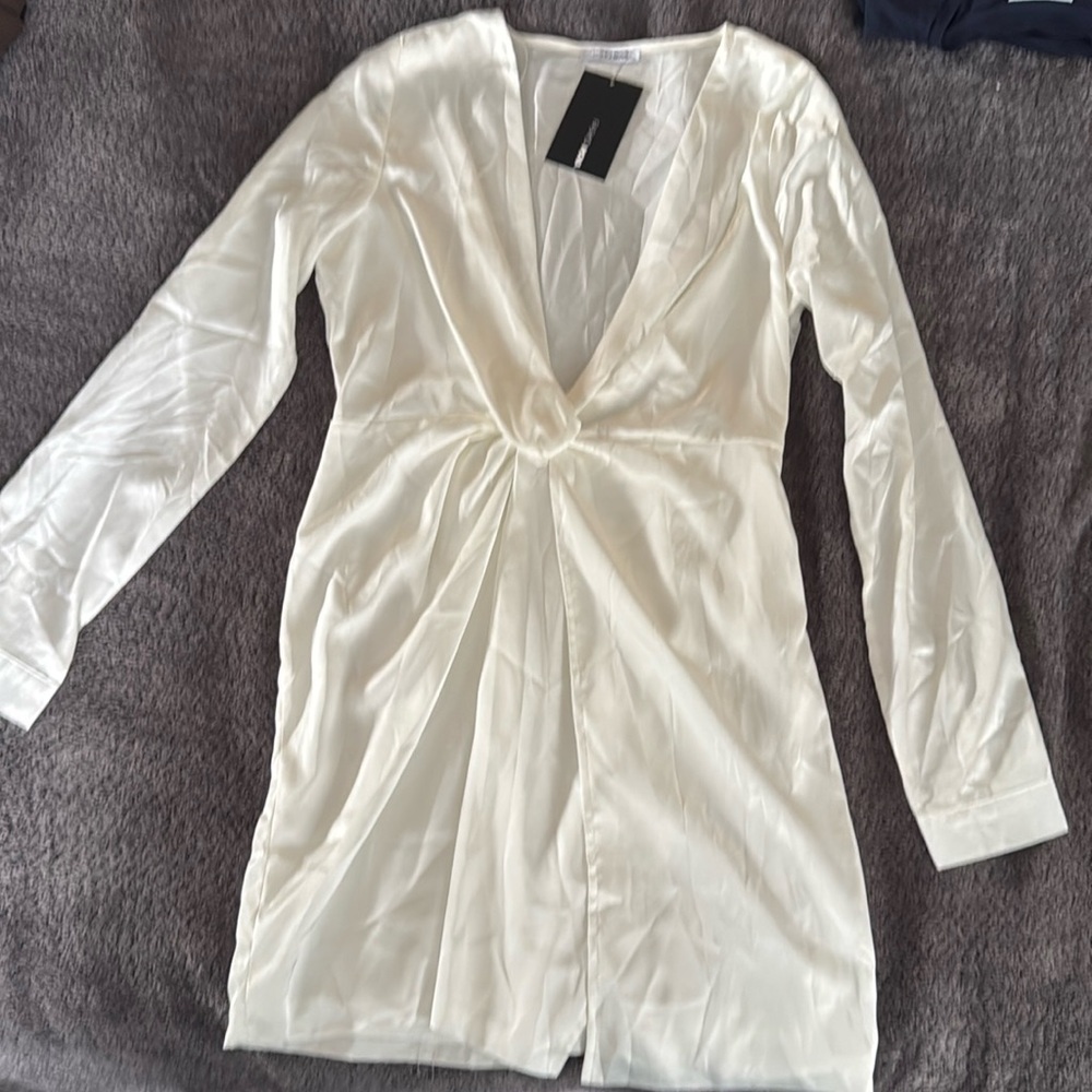 Satin white pearl shirt. Brand new with tag, never used.